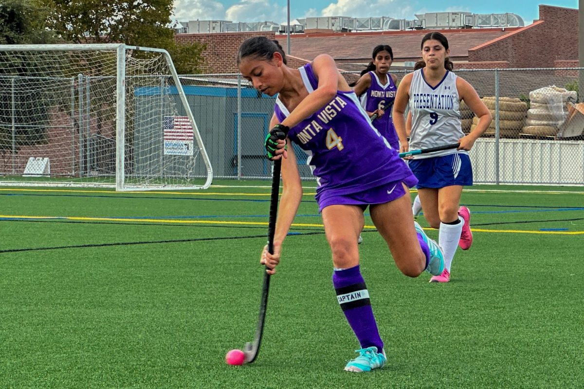 Senior Monisha Preetham dribbles the ball down the field in a game against Presentation High School where the team lost 9-0 on Sept. 17. Photo | Angela Poon