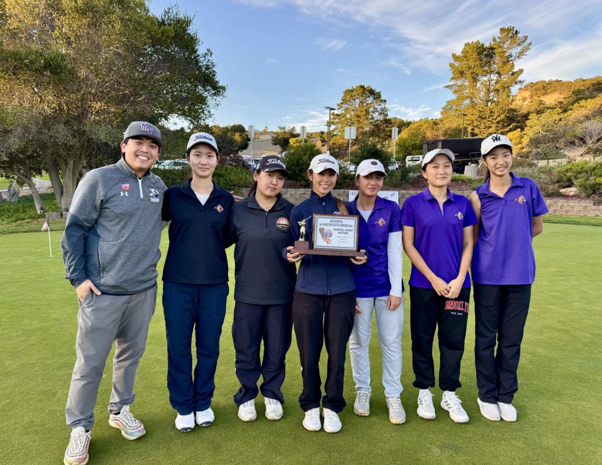 Head Coach Kenneth Gan, sophomore Michelle Wang, senior Katie Hwang, junior Addison Lee, sophomore Melody Liu, freshman Ellie Kong and freshman Summer Liu pose for a photo after their third place finish in the CCS tournament. Photo courtesy of Katie Hwang | Used with permission 