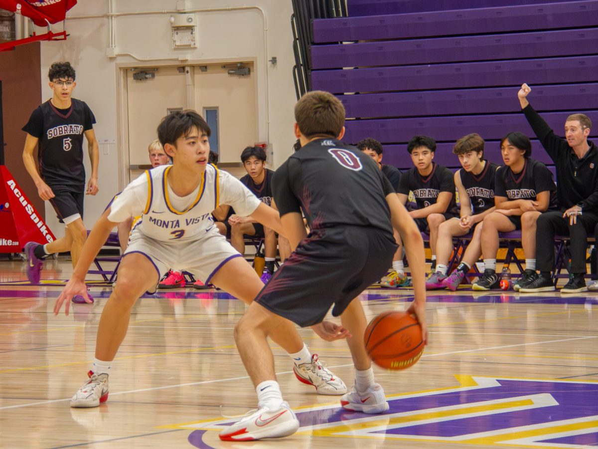 Sophomore shooting guard and small forward Leo Lee guards an ASHS player. Photo | Elizabeth Yang