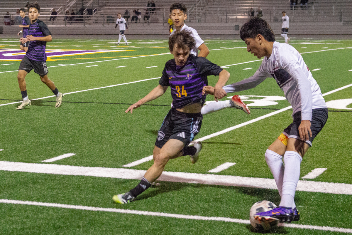 Junior and striker Ivan Shliakhov attempts to steal the ball from an FHS player. Photo | Ritik Shenoy