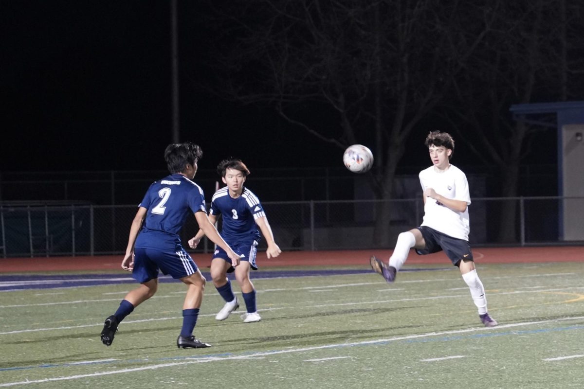 Junior forward Lewly Tzankov attempts to score a goal through two LHS defenders. Photo | Maahi Dev
