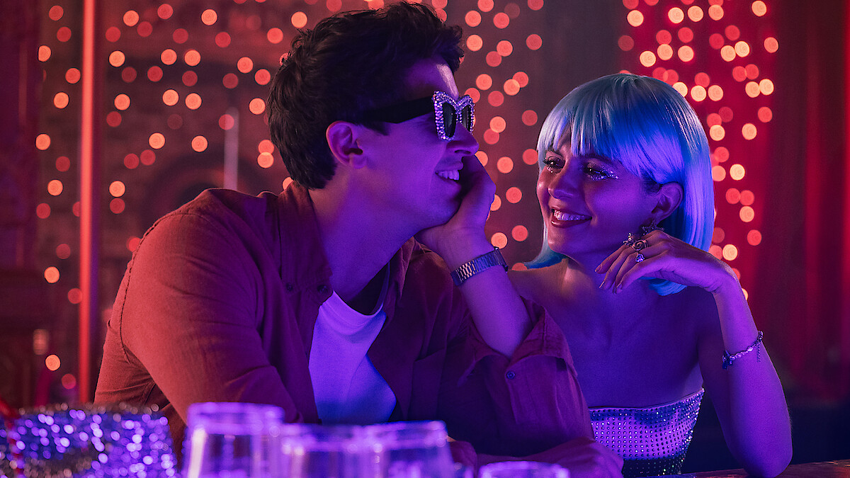Poppy Wright (Emily Bader) and Alex Nilsen (Tom Blyth) smile at each other during one of the many vacations they take together throughout the film. Photo by Michele K. Short | Photo courtesy of Netflix