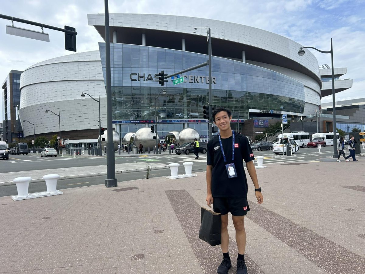 Sophomore Jonathan Hom poses next to Chase Center before his experience as a ball kid at the Laver Cup, an international tennis tournament. Photo courtesy of Jonathan Hom | Used with permission