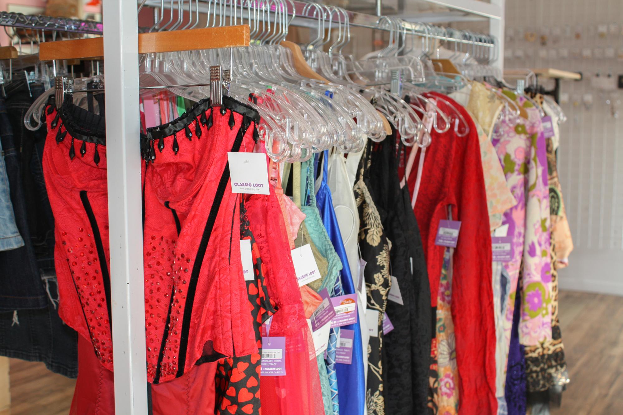 A colorful rack at Classic Loot showcases several unique clothing choices, a trait promotes the diversity of materials and styles within a thrift store. Photo | Sana Karkhanis