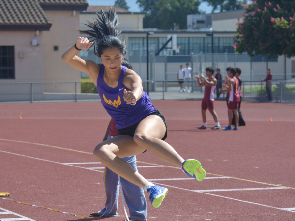 Lelani Laruelle competes in long jump at a track and field meet at Fremont High School. Photo | Stella Petzova