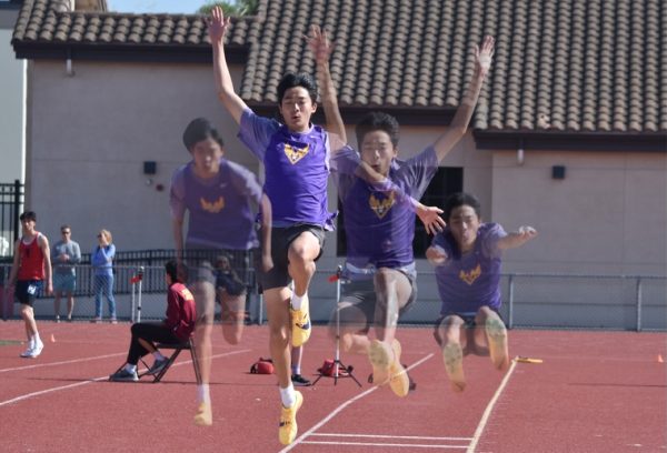 Senior Ryan Shen guides his feet forward to gain maximum distance on his long jump trial during the El Camino All League Championship meet on Friday, May 1. Photo | Sophia D’Sa 