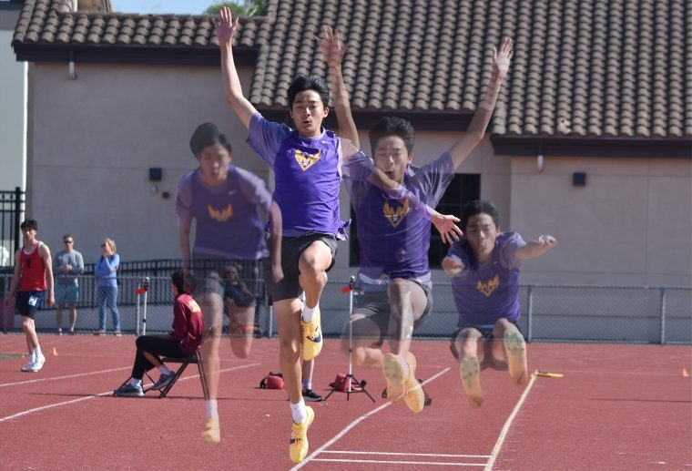 Senior Ryan Shen guides his feet forward to gain maximum distance on his long jump trial during the El Camino All League Championship meet on Friday, May 1. Photo | Sophia D’Sa 